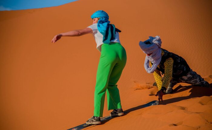 Sandboarding in Merzouga Dunes